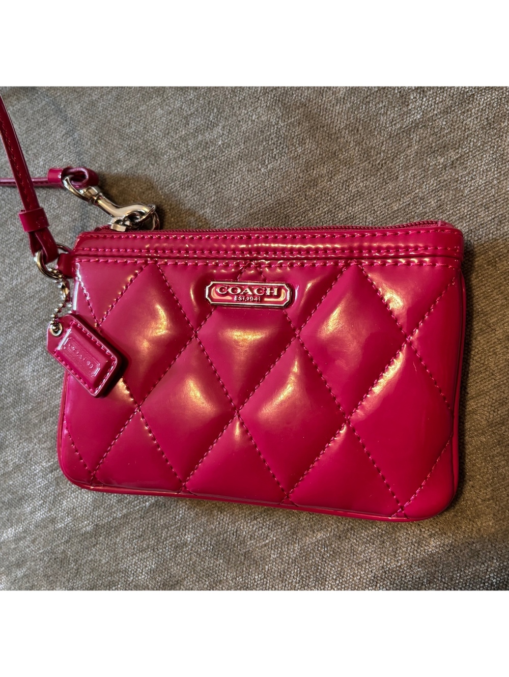 Coach Poppy Quilted Patent Leather Wristlet in Hot Pink